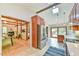 Bright kitchen with stainless steel appliances, island, and access to the outdoors at 36 Birnamwood Dr, Chapel Hill, NC 27516