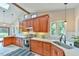 Stylish kitchen with stainless steel appliances and great natural light from a large window at 36 Birnamwood Dr, Chapel Hill, NC 27516