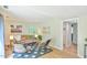 Stylish living room showcasing a comfortable sofa, eclectic decor, and ample natural light at 36 Birnamwood Dr, Chapel Hill, NC 27516