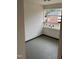 Enclosed balcony area with view of neighboring building at 3601 Helix Ct # 301, Raleigh, NC 27606