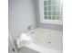 Modern bathroom with a built-in tub and chrome fixtures, creating a relaxing space at 3684 Ben Mil Ct, Franklinton, NC 27525