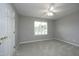 Bright bedroom is enhanced by a ceiling fan and natural light streaming through the window at 3684 Ben Mil Ct, Franklinton, NC 27525