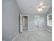 Spacious bedroom featuring neutral carpet and a ceiling fan for comfort and energy efficiency at 3684 Ben Mil Ct, Franklinton, NC 27525
