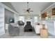Bright living area featuring a fireplace, built-in shelving and neutral decor that's both inviting and stylish at 3684 Ben Mil Ct, Franklinton, NC 27525