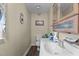 A full bathroom featuring a single sink and a standard toilet at 4038 Redwood Rd, Durham, NC 27704