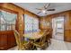 Inviting kitchen with wood details, a round wooden table, and floral curtains for a cozy feel at 4038 Redwood Rd, Durham, NC 27704