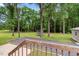 Beautiful backyard featuring a green lawn and mature trees at 4524 Sugar Maple Rd, Oxford, NC 27565