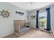 Nautical-themed bedroom with blue accents and natural light at 4524 Sugar Maple Rd, Oxford, NC 27565