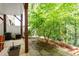 View of the backyard featuring a patio and lush greenery at 4724 Ludwell Branch Ct, Raleigh, NC 27612