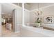 Elegant dining room with chandelier, tall ceilings, hardwood floors and view of living room at 4724 Ludwell Branch Ct, Raleigh, NC 27612