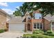 Charming two-story home featuring a combination of brick and stone facade, plus a two-car garage at 4724 Ludwell Branch Ct, Raleigh, NC 27612