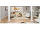 Open-concept living room highlighting modern furniture, open layout and an eat-in kitchen at 4724 Ludwell Branch Ct, Raleigh, NC 27612