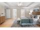 Large main bedroom with tray ceiling, en suite, and walk in closet at 4724 Ludwell Branch Ct, Raleigh, NC 27612