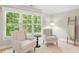 Cozy bedroom sitting area with view and ladder at 4724 Ludwell Branch Ct, Raleigh, NC 27612