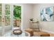 Charming sitting area with a view to the deck and sliding glass doors at 4724 Ludwell Branch Ct, Raleigh, NC 27612