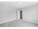 Bright bedroom with carpet and neutral walls at 4896 Grosbeak Ct, Mebane, NC 27302