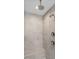 Walk-in shower featuring tile walls and dual shower heads at 4896 Grosbeak Ct, Mebane, NC 27302