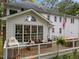 Outdoor deck featuring comfortable seating and BBQ grill providing ample space for relaxation and entertaining at 5109 Makena Dr, Raleigh, NC 27615