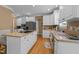 Spacious kitchen featuring a large island and stainless steel appliances at 5109 Makena Dr, Raleigh, NC 27615
