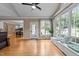 Bright living room with hardwood floors, large windows and built-in bench seating at 5109 Makena Dr, Raleigh, NC 27615