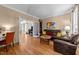 Comfortable living room featuring hardwood floors and stylish furnishings at 5109 Makena Dr, Raleigh, NC 27615