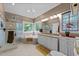 Spacious main bathroom with soaking tub, walk-in shower, and double vanity at 5109 Makena Dr, Raleigh, NC 27615