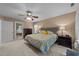 Bright main bedroom with ensuite bathroom access and ample space at 5109 Makena Dr, Raleigh, NC 27615