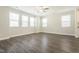 Bright and airy living room with hardwood floors, recessed lighting, and a modern ceiling fan at 5334 River Reach Dr, Raleigh, NC 27616