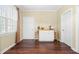Dining area featuring a built-in cabinet with breakfast bar and natural light from the window at 59 Carrousel Ct, Angier, NC 27501