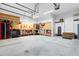 Spacious garage with workbench, storage shelving and pegboard at 59 Carrousel Ct, Angier, NC 27501