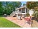 Back patio with brick pavers featuring outdoor seating and grilling area at 59 Carrousel Ct, Angier, NC 27501