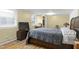 Cozy bedroom with natural light, wood floors, and traditional furnishings at 603 Nellane Dr, Garner, NC 27529