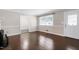 Living room with a fireplace, window, and a door that allows lots of natural light at 603 Nellane Dr, Garner, NC 27529