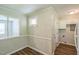 Kitchen and dining area features fresh paint and new wood-look flooring at 605 Sexton Ave, Zebulon, NC 27597