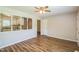 Cozy living room featuring wood floors, natural light and an open view to the kitchen at 605 Sexton Ave, Zebulon, NC 27597