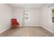 Bright bedroom featuring hardwood floors and natural light at 611 Rowland St, Henderson, NC 27536