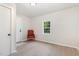 Bedroom with hardwood floors and bright natural light at 611 Rowland St, Henderson, NC 27536
