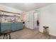Bright kitchen with butcher block countertops, floating shelves, and stainless steel sink at 611 Rowland St, Henderson, NC 27536