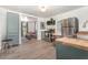 Cozy kitchen with stainless steel appliances, butcher block countertops, and open view to the living room at 611 Rowland St, Henderson, NC 27536