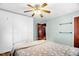 Bedroom features wood floors, ceiling fan, large closets, and neutral wall paint at 625 Columbia Ave, Burlington, NC 27217