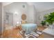 Bright bedroom with hardwood floors and a vaulted ceiling with plenty of natural light at 708 October Woods Rd, Chapel Hill, NC 27516