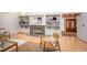 Elegant living room featuring built-in shelving, a fireplace, and stylish furniture at 708 October Woods Rd, Chapel Hill, NC 27516