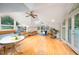 Bright living space with vaulted ceilings, hardwood floors, and multiple windows at 708 October Woods Rd, Chapel Hill, NC 27516