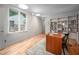 Office space with natural light, built-in bookshelves, and wood floors at 708 October Woods Rd, Chapel Hill, NC 27516
