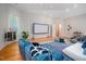 Well-lit recreation room with large movie screen and casual seating arrangements at 708 October Woods Rd, Chapel Hill, NC 27516
