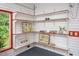 Storage room with corner shelving for art display at 708 October Woods Rd, Chapel Hill, NC 27516