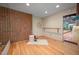 Bright studio space with hardwood floors, barre, brick accent wall, and natural light at 708 October Woods Rd, Chapel Hill, NC 27516