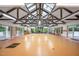 Bright sunroom boasts vaulted ceilings, exposed beams, skylights and multiple windows at 708 October Woods Rd, Chapel Hill, NC 27516