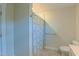 Bright bathroom with tiled floors, neutral paint, and shower with curtain at 729 Lorentello Cir, Hillsborough, NC 27278