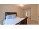 Bedroom with a ceiling fan and a glass door entrance to another room at 729 Lorentello Cir, Hillsborough, NC 27278